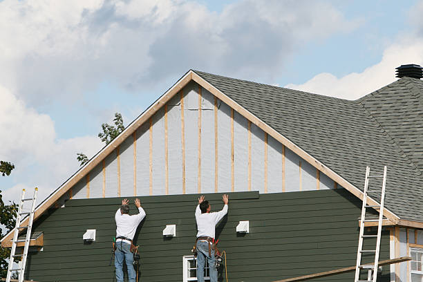 Professional Emergency Siding Repair technician working in Fredericksburg, VA